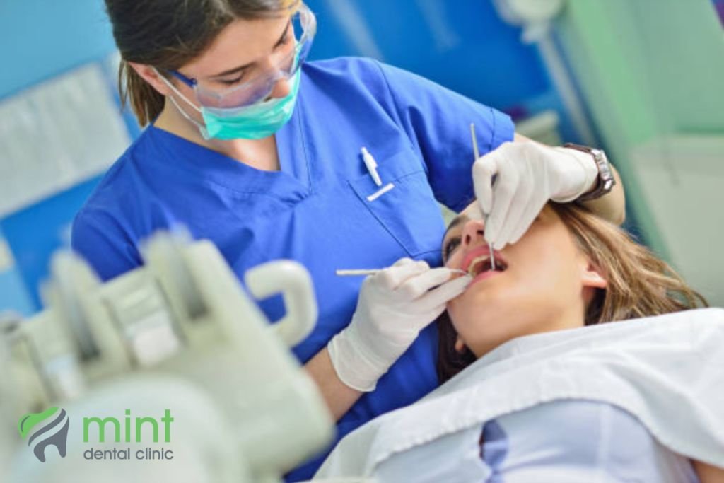 image of dentist examining a patient